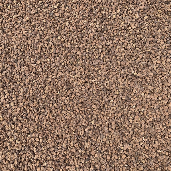 pea gravel is easier to walk on than larger rocks, provides good drainage, and is less likely to scatter underfoot